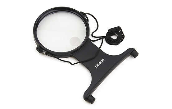 MagniFree™ a Hands Free, hanging 2x Magnifier with a 3.5x power bi-focal spot lens.